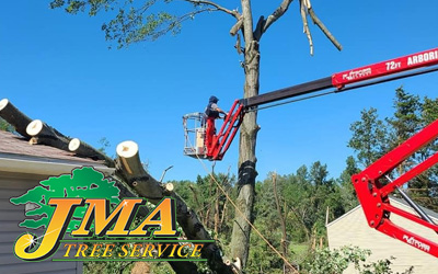 JMA Employee safely operating a spider lift
