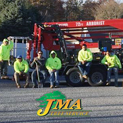 JMA Tree Service Staff in front of equipment